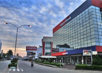 Kasus Laporan Ganda Bank Lippo: Analisis Pelanggaran Etika dan Implikasinya