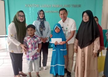 Kelurahan Pamulang Timur Bersama BAZNAS Tangsel Salurkan Santunan untuk 50 Anak Yatim