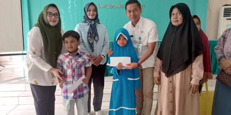 Kelurahan Pamulang Timur Bersama BAZNAS Tangsel Salurkan Santunan untuk 50 Anak Yatim