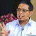Transformasi Karier Hasan Nasbi, Dari PCO ke Komisaris BUMN Energi